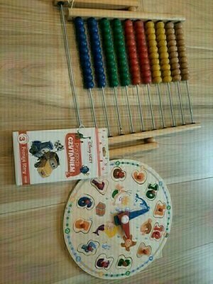 Elbląg Sprzedam zabawki edukacyjne dla dziecka:
- liczydła z Ikea (drewniane, duże, kolorowe), 
- zegar (drewniany,